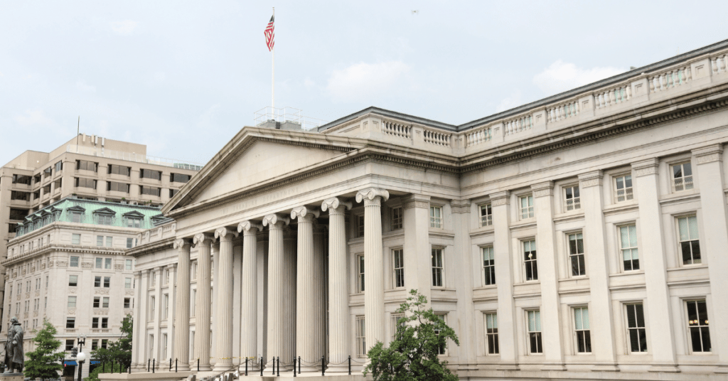 Treasury building in Washington, D.C. on a cloudy day.